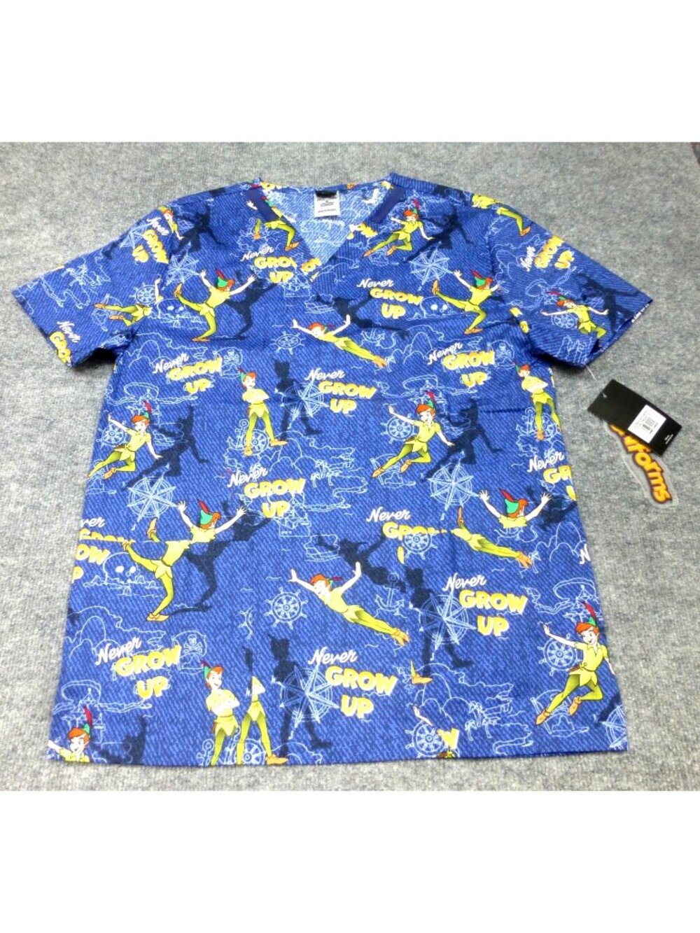 NWT Disney Tooniforms Peter Pan "Never Grow Up" Unisex Scrub Top Modern Fit Blue
